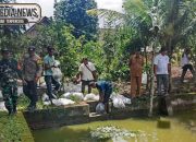 Polsek Madang Suku I Dukung Ketahanan Pangan, Kirim Personil Pantau Pelepasan Benih Ikan