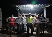 Bhabinkamtibmas Polsek Madang Suku I Lakukan Pengecekan Ronda Malam di Desa Jaya Bakti