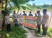 Pencegahan Bahaya Tenggelam, Polsek Madang Suku I Pasang Himbauan Larangan Berenang di Sungai