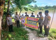Bhabinkamtibmas Polsek Madang Suku I Himbau Warga Gunung Terang Hindari Aktivitas Mandi dan Berenang di Sungai