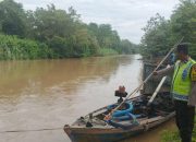 Polsek Madang Suku I Monitoring Debit Air Sungai Komering, Kondisi Relatif Normal dan Aman