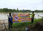 Cegah Bahaya Tenggelam, Bhabinkamtibmas Polsek Madang Suku I Sosialisasikan Larangan Mandi di Sungai
