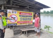 Aiptu Zulkarnaen Imbau Warga di Tepian Sungai Komering Waspadai Bahaya Tenggelam Saat Musim Hujan