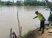 Polsek Madang Suku I Lakukan Monitoring Debit Air Sungai Komering, Pemukiman Warga Masih Aman