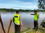 Polsek Madang Suku I Monitoring Debit Air Sungai Komering, Kondisi Desa Rasuan Masih Aman