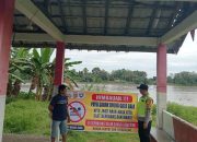 Cegah Tenggelam, Polsek Madang Suku I Sosialisasikan Larangan Mandi di Sungai Komering