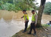Polsek Madang Suku I Monitoring Debit Air Sungai Komering, Warga Desa Rasuan Masih Aman dari Banjir