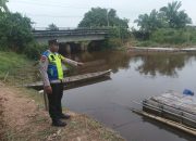 Polsek Madang Suku I Monitoring Debit Air Sungai Komering, Kondisi Masih Aman dari Banjir