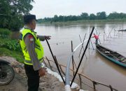 Debit Sungai Komering Naik, Polsek Madang Suku I Pastikan Wilayah Masih Aman dari Banjir