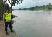 Polsek Madang Suku I Monitoring Debit Air Sungai Komering, Kondisi Masih Aman dari Banjir