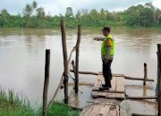 Polsek Madang Suku I Monitoring Debit Air Sungai Komering, Wilayah Masih Aman dari Banjir