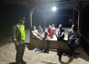 Pastikan Kamtibmas Kondusif, Polsek Madang Suku I Monitoring Ronda Malam di Desa Tugu Mulyo