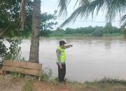 Polsek Madang Suku I Monitoring Debit Sungai Komering di Dusun Kepuh Desa Rasuan