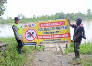 Cegah Risiko Kecelakaan, Polsek Madang Suku I Sosialisasikan Larangan Mandi di Sungai