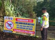 Cegah Risiko Tenggelam, Aiptu Andres Imbau Warga Hindari Aktivitas di Sungai