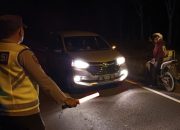 Patroli Malam Polsek Madang Suku I Intensifkan Pengawasan Wilayah Jelang Waktu Istirahat Warga