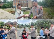 Kapolsek Madang Suku II Gelar “Jumat Berbagi”, Bagikan Alat Tulis dan Botol Minum kepada Pelajar dan Warga