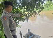 Polsek BP Peliung Intensifkan Monitoring Debit Air Sungai Komering, Warga Diminta Tetap Waspada