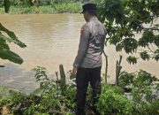 Polsek BP Peliung Intensifkan Monitoring Debit Air Sungai Komering, Warga Diminta Tetap Waspada