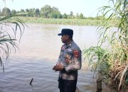 Polsek BP Peliung Intensifkan Monitoring Debit Sungai Komering, Warga Diminta Tetap Waspada