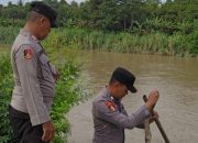 Polsek BP Peliung Monitoring Debit Sungai Komering, Kondisi Pemukiman Warga Masih Aman