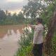 Antisipasi Dampak Cuaca Ekstrem, Polsek BP Peliung Pantau Intensif Debit Air Sungai Komering