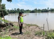 Polsek Madang Suku I Pastikan Kondisi Sungai Komering Stabil, Permukiman Warga Aman dari Ancaman Banjir
