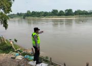 Polsek Madang Suku I Pantau Debit Sungai Komering, Wilayah Rawan Banjir Masih Kondusif