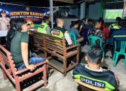 Nobar Piala Dunia 2026 di Desa Tulus Ayu, Polsek Madang Suku I Perkuat Sinergitas Bersama Masyarakat