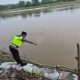 Polsek Madang Suku I Pantau Debit Sungai Komering, Kondisi Wilayah Pesisir Masih Aman dari Banjir