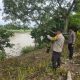 Polsek BP Peliung Pastikan Kondisi Sungai Komering Aman, Personel Rutin Pantau Debit Air di Titik Rawan Banjir