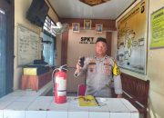 Mantapkan Kesiapsiagaan, Aiptu Andres Laksanakan Pengamanan Mako Polsek Madang Suku I