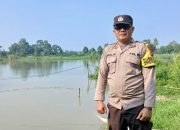 Debit Sungai Komering Berangsur Normal, Polsek Buay Pemuka Peliung Pastikan Permukiman Warga Tetap Aman