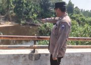 Debit Sungai Komering Mulai Normal, Polsek BP Peliung Pantau Permukiman Warga