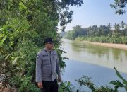 Antisipasi Banjir, Polsek BP Peliung Pantau Debit Sungai Komering di Sejumlah Titik Rawan
