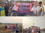 Cegah Karhutla, Bhabinkamtibmas Polsek Madang Suku I Pasang Banner dan Edukasi Warga