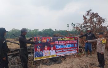 Aipda Saleh Gencarkan Mitigasi Karhutla, Banner Imbauan Dipasang di Wilayah Madang Suku I