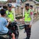 Polsek BP Peliung Berbagi 10 Paket Makanan, Kapolsek Bastian Marratin: Bentuk Kepedulian kepada Sesama