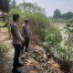 Antisipasi Banjir, Polsek BP Peliung Pantau Debit Sungai Komering dan Permukiman Warga