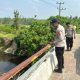 Polsek BP Peliung Cek Debit Sungai Komering, Permukiman Bantaran Sungai Masih Aman