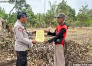 Kasium Polsek BP Peliung Pasang Banner Larangan Bakar Lahan