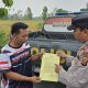 Antisipasi Bencana Asap, Kasium Polsek BP Peliung Sosialisasikan Imbauan dan Pasang Spanduk Peringatan Karhutla